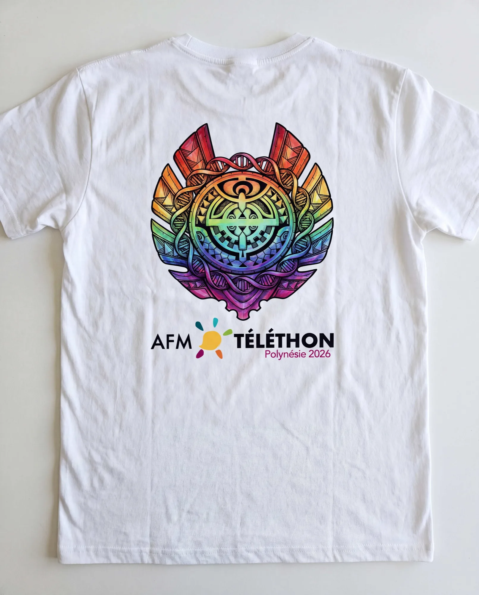 White t-shirt mockup showing the Téléthon Polynésie 2026 emblem printed on the back